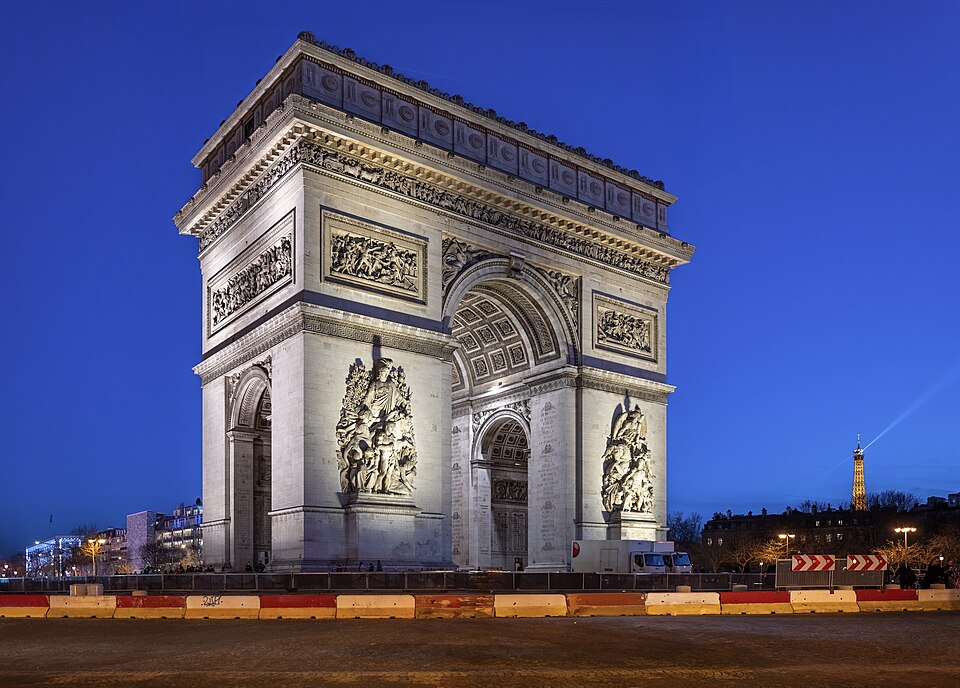 The Arc de Triomphe lit up at night